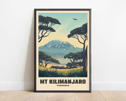 Framed vintage travel poster of Mount Kilimanjaro, featuring a classic retro design with warm tones.